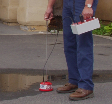 an american leak detection of fort worth technician checking for a slab leak